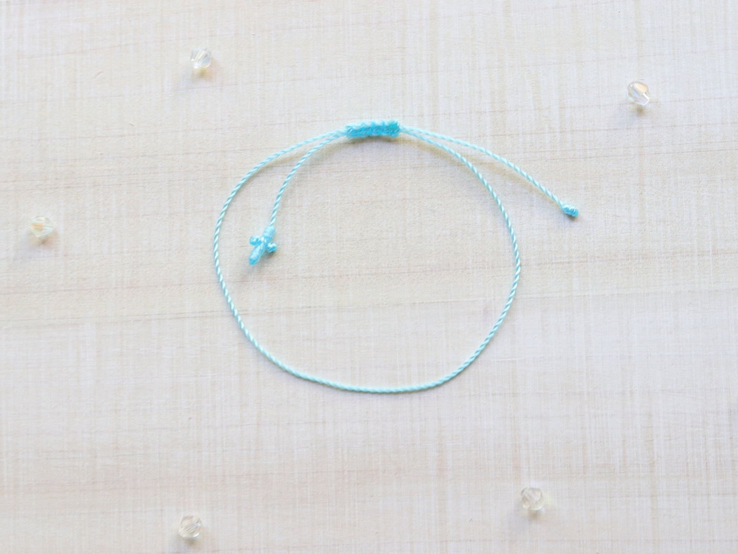 Tiny Cross Cord Bracelet