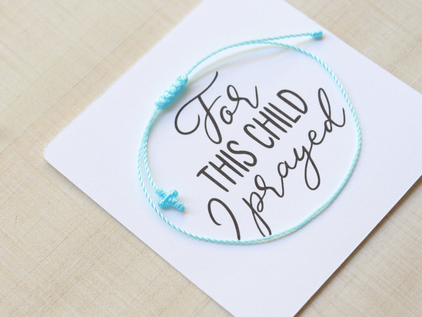 Tiny Cross Cord Bracelet